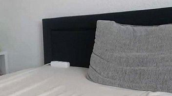 Busty cam girl masturbates with glass dildo