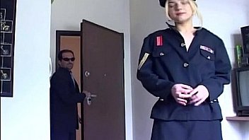 Blonde in uniform fucking in black stockings