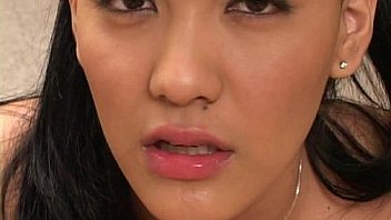 Asian lady trying the american flavour