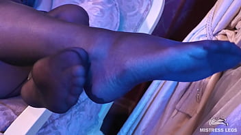 Enjoy my feet in sexy black nylons with flower prints on my heels