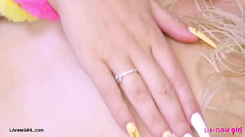 Radiant blonde beauty naked close up