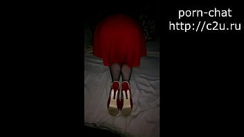 A girl in a chic dress shows her charms