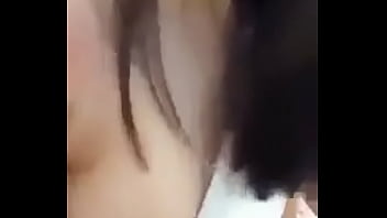 Girl showing her medium size melons