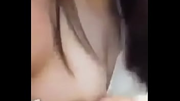 Girl showing her medium size melons