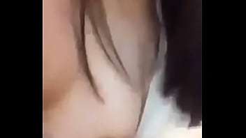 Girl showing her medium size melons