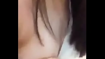 Girl showing her medium size melons