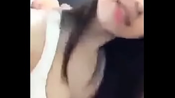 Girl showing her medium size melons