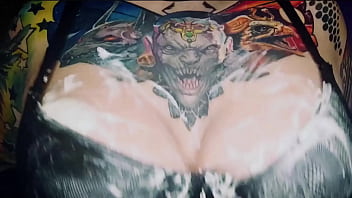 Sexy horny clown girl with a perfect ass has naughty fun with whipped cream at her kitchen