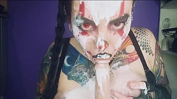 Sexy horny clown girl with a perfect ass has naughty fun with whipped cream at her kitchen