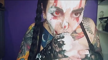 Sexy horny clown girl with a perfect ass has naughty fun with whipped cream at her kitchen