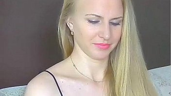 Blonde prostitute stares into the cam and waits for you to cum all over her face