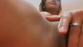 Busty beauty rubbing her pussy