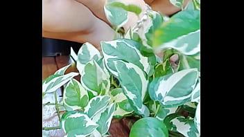 Horny mature gapes while she gardens