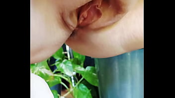 Horny mature gapes while she gardens