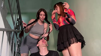 Ash dirt from shoe soles and spit fill slave's mouth after the mockery by two mistresses