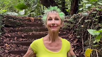 In the ruins of the abandoned house in the jungle i walk down and up the remaining stairs and give a brief flash at