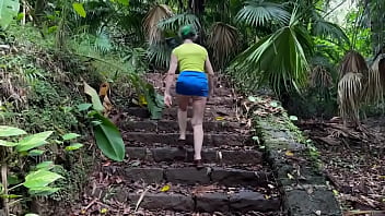 In the ruins of the abandoned house in the jungle i walk down and up the remaining stairs and give a brief flash at