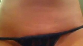 Young blonde beauty teasing her body