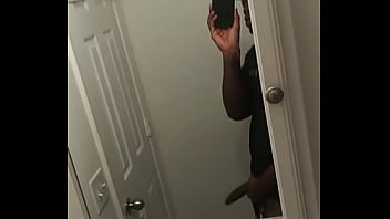 Young adult jerks off in the bathroom