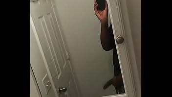 Young adult jerks off in the bathroom