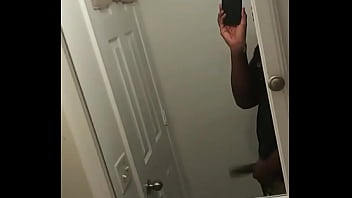 Young adult jerks off in the bathroom