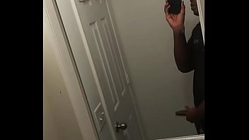 Young adult jerks off in the bathroom