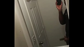 Young adult jerks off in the bathroom