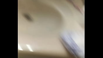 Young adult jerks off in the bathroom