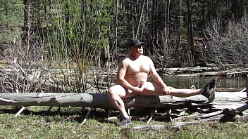 Sitting naked at the river