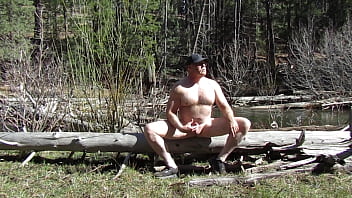 Sitting naked at the river