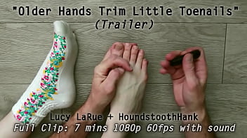 Older hands trim little toenails