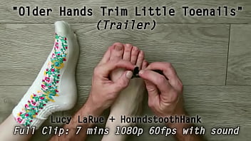 Older hands trim little toenails