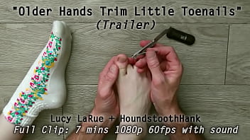 Older hands trim little toenails