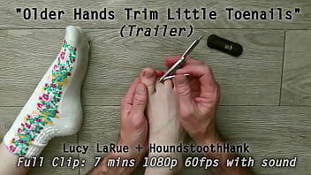 Older hands trim little toenails