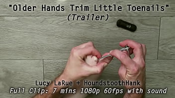 Older hands trim little toenails