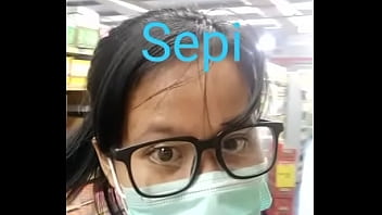 Chinese girl in supermarket