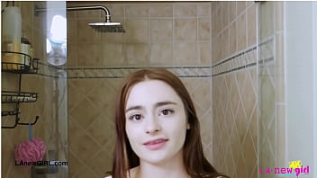 Shy brunette model enjoys a sensual bath