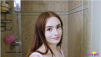 Shy brunette model enjoys a sensual bath