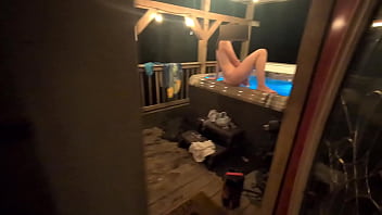 Wife fucks her toy in the hot tub in public