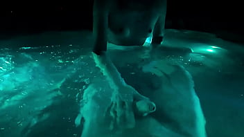 Wife fucks her toy in the hot tub in public