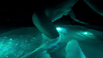 Wife fucks her toy in the hot tub in public