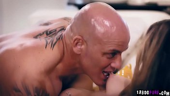 Athena still eyes him with contempt then reluctantly takes a sexy stance and slowly removes the thick jacket