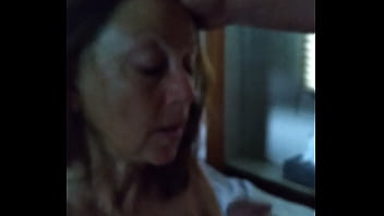 Amateur milf candi annie sucks cock and swallows a mouthful of cum from a fan in her rv