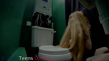 Horny nurse sucks cock at the gloryhole