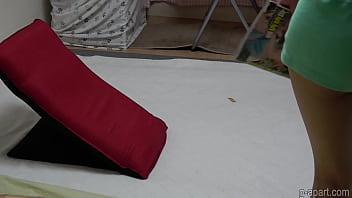 A slender girl with nice tits begins masturbating