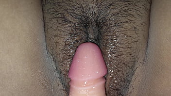 Stuffing toy dick in her cunt