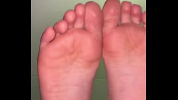 Girl feet sock removal