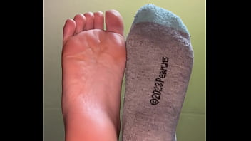 Girl feet sock removal