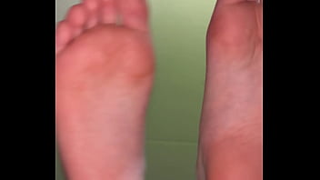 Girl feet sock removal