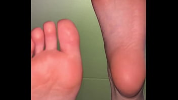 Girl feet sock removal